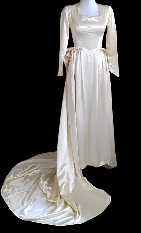 1940s Princess Style Liquid Satin Wedding Dress in Warm Candlelight Ivory White with Queen Anne Neckline, Cathedral Train and Detailed Pleated Bustle